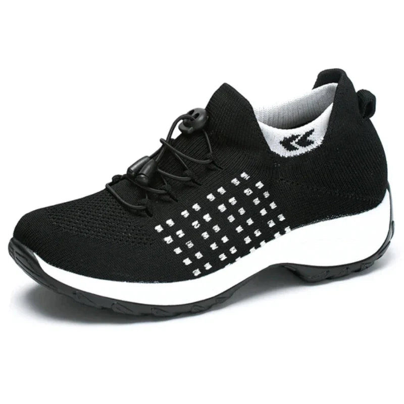 Avena sneakers in black green color variant angled view