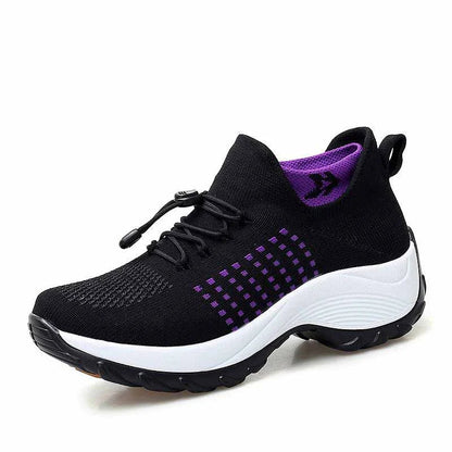 Lightweight women's sneakers in grey color on white background