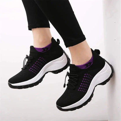 Avena black and white women's sneakers flat lay