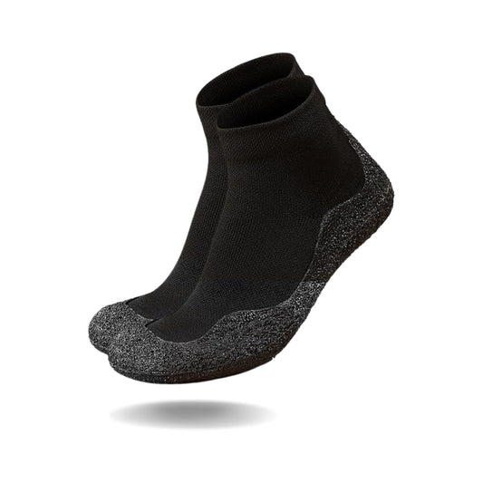 Top-down view of barefoot sock shoes with wide toe box and snug fit
