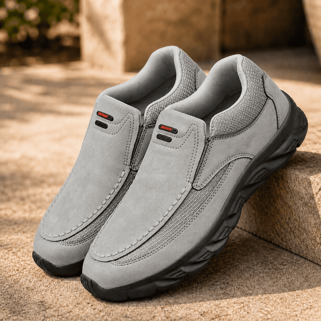 Callum grey slip-on shoes showcasing soft interior and handcrafted construction