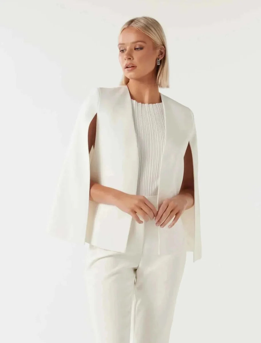 Celeste women's cape blazer in white with open slit sleeves and relaxed fit