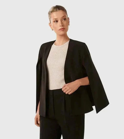 Close-up of cape blazer slit sleeve detail and clean shoulder seam