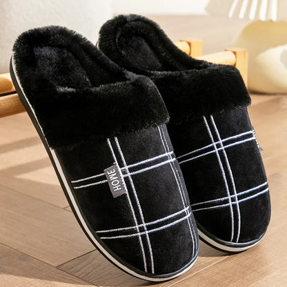 Person wearing grey Cozy plush cotton slippers at home