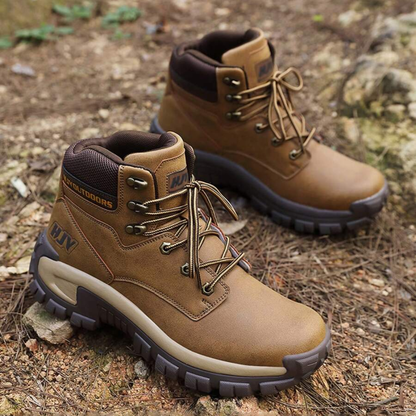 Crestwick black hiking boots for men on wet and muddy terrain