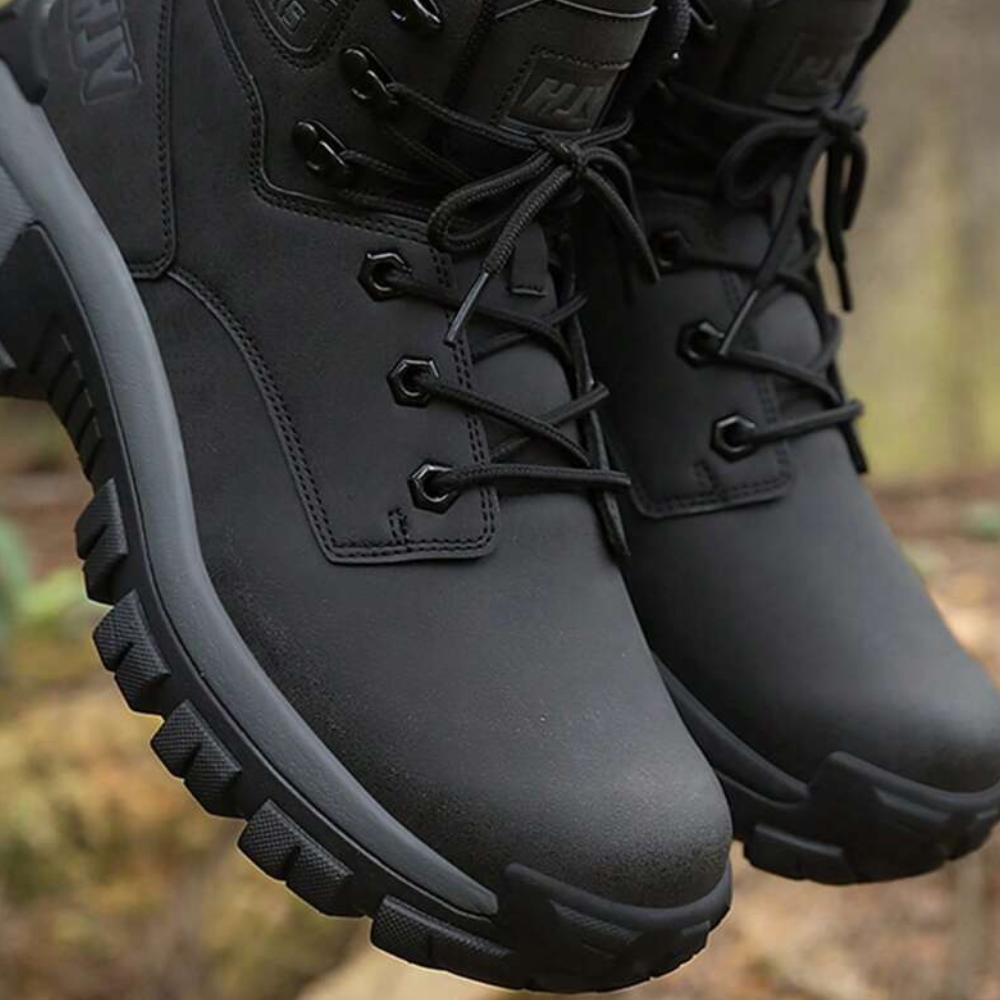 Crestwick brown hiking boots for men on a rocky outdoor surface