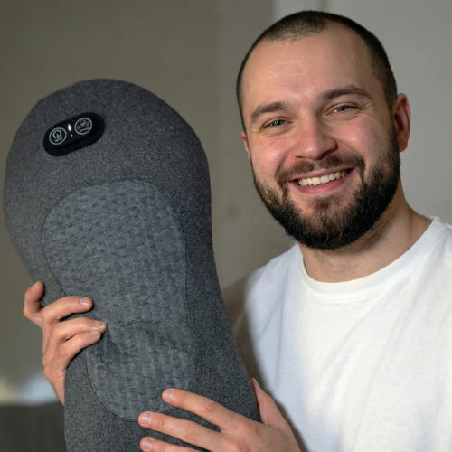 Deep Relief massager shown on a yoga mat in a home setting