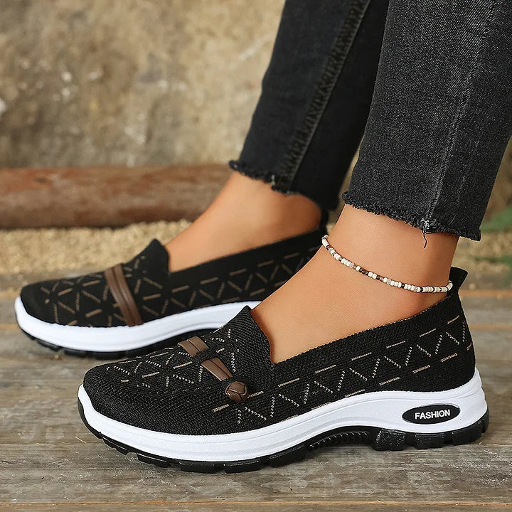 Beige knit slip-on shoes showing all-day comfort support sole
