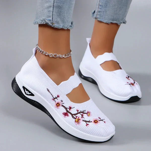 Top-down view of Fiona comfort sneakers in white with casual style