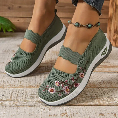 Fiona women's comfort sneakers in grey worn during a casual outing