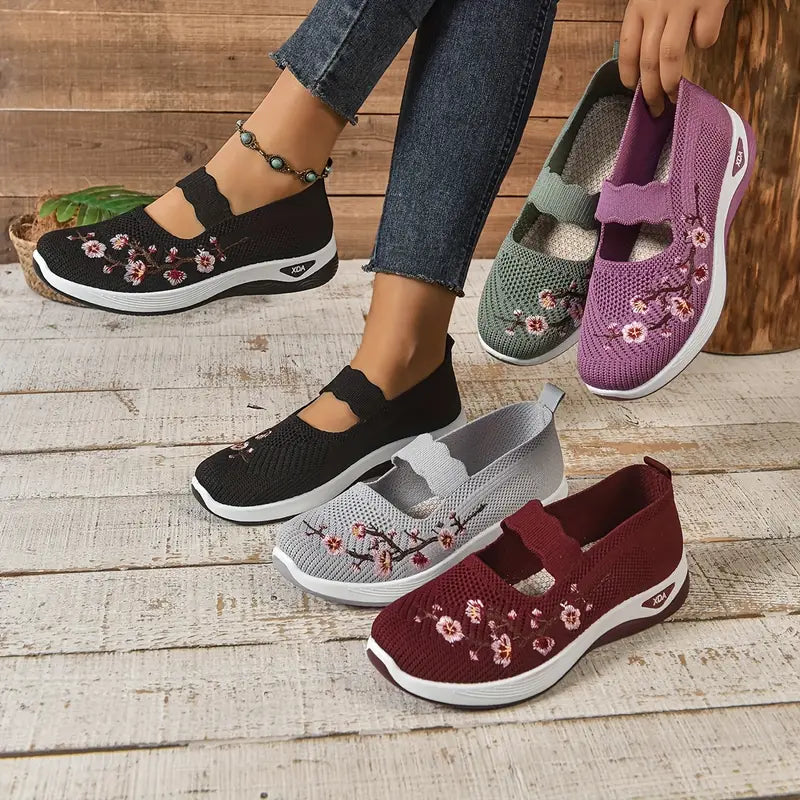 Pair of Fiona sneakers in black showing bunion alignment support detail