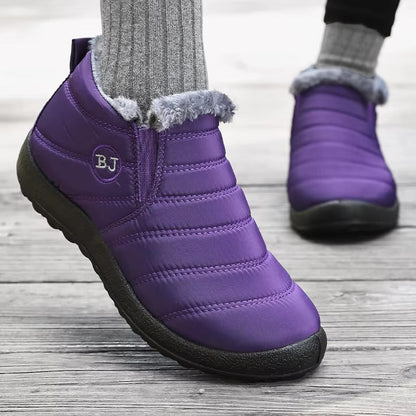 Side view of faux-fur lined winter boot showing stretch panel