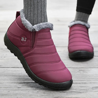 Black waterproof slip-on winter boots with faux-fur lining