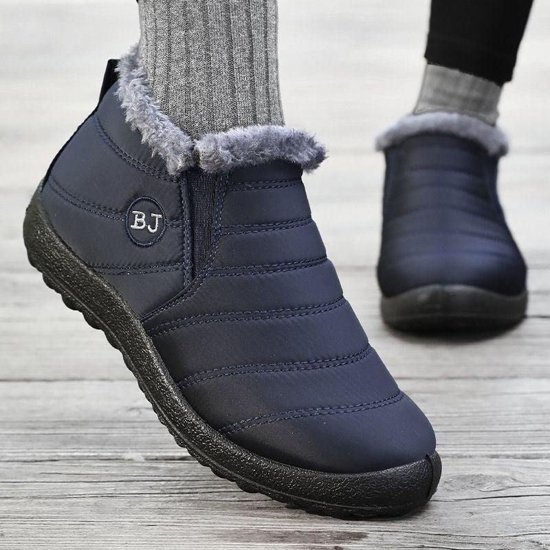 Brown women's slip-on winter boots with plush faux-fur lining