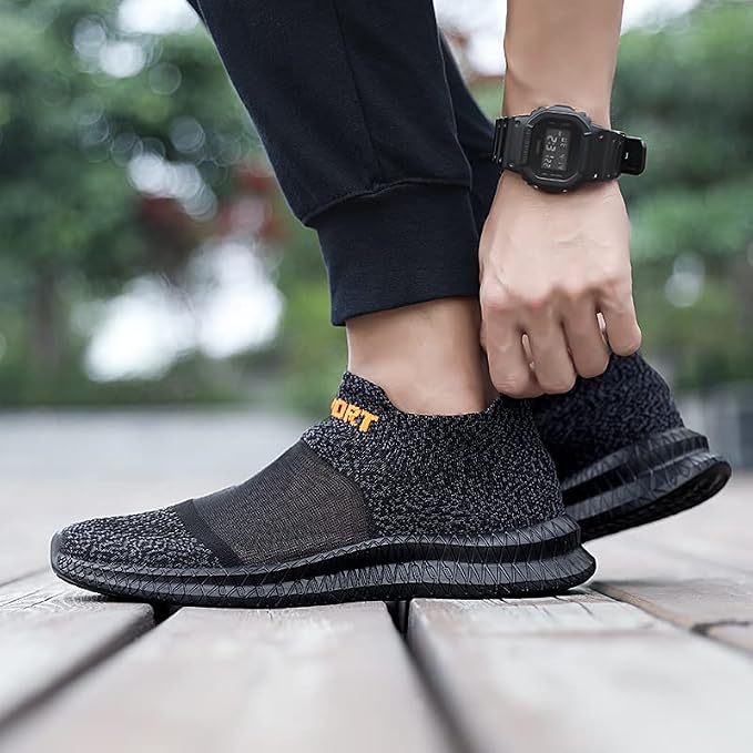 Side view of men's lightweight knit slip-on sneakers in grey