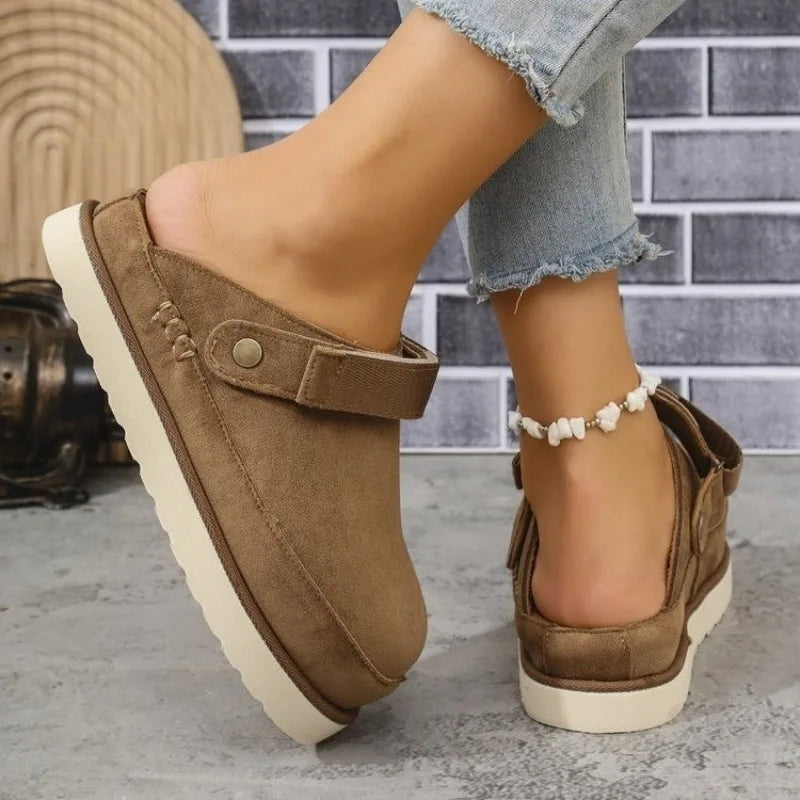 Women's slip-on platform clogs with closed round toe in brown