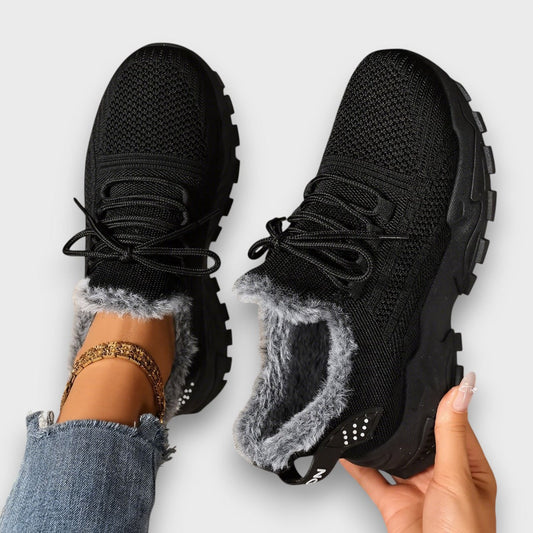 Kayla women's winter sneakers with lace-up closure in black, warm faux fur lining