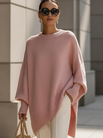 Front view of Liora oversized poncho in black showing relaxed silhouette and round neckline