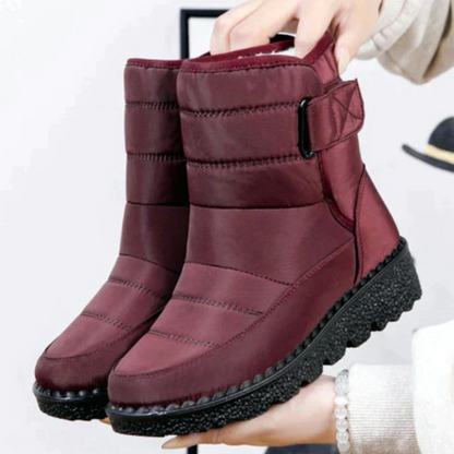 Lotte waterproof boots in red — warm fleece-lined interior