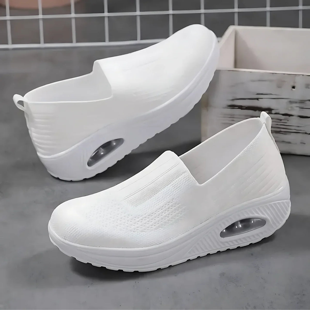 Front view of women's orthopedic sneakers with structured outsole detail