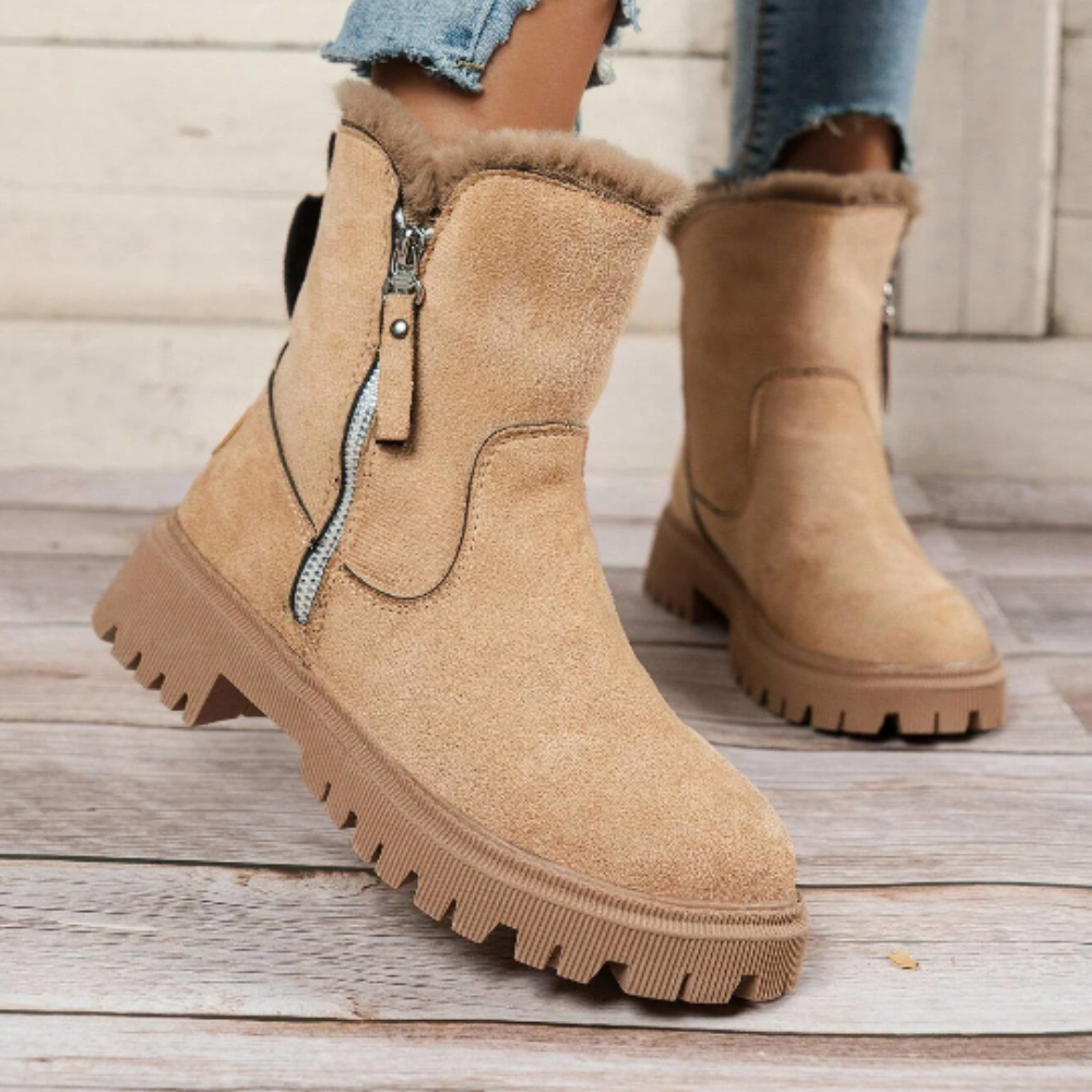 Beige women's winter boots styled for cold weather outfits