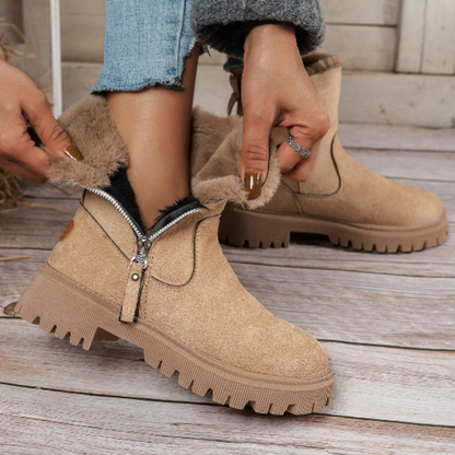 Black winter boots with water-resistant outer material