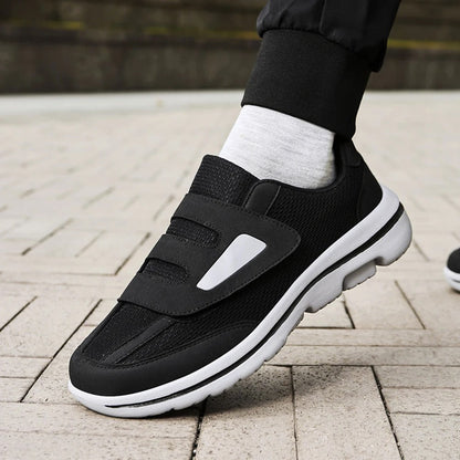 Men's black and gray wide fit walking shoes suitable for daily indoor and outdoor use