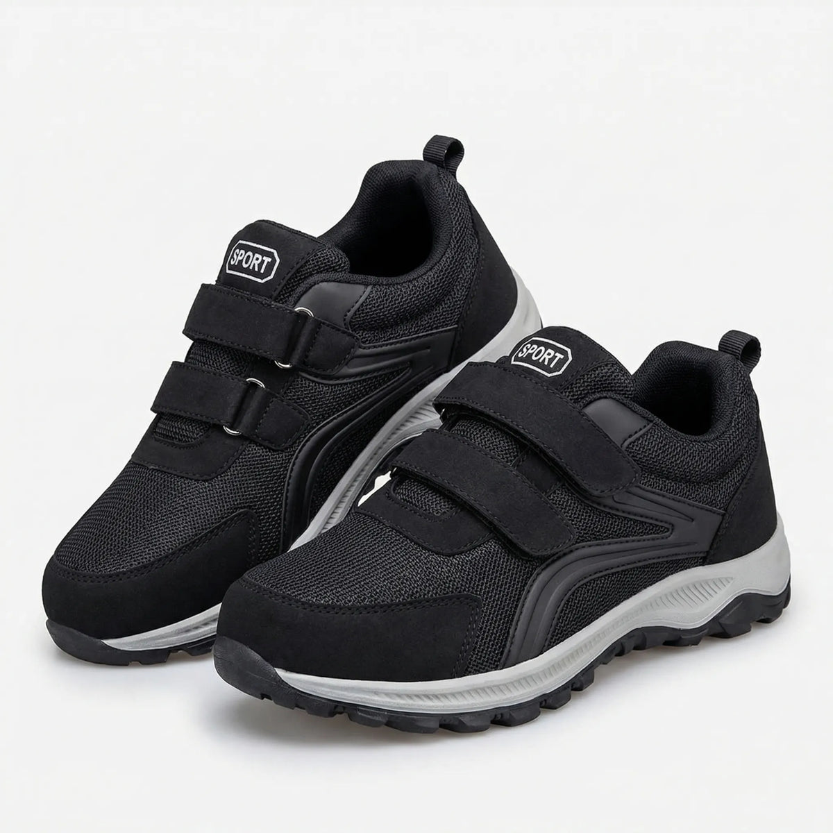 Aldor wide-fit walking trainers shown from the side in dark blue