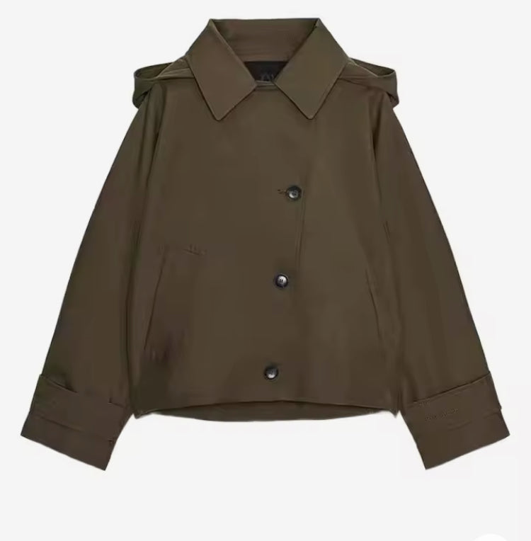 Women's short trench coat hood detail, discreet hooded design