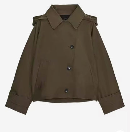 Women's short trench coat hood detail, discreet hooded design