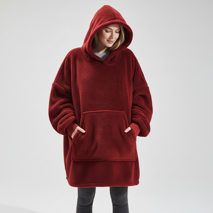 Women wearing oversized fleece hoodie robe with hood up — cosy fit