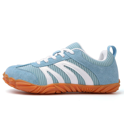 Side view of Rovik green unisex sneakers showing contrasting panels