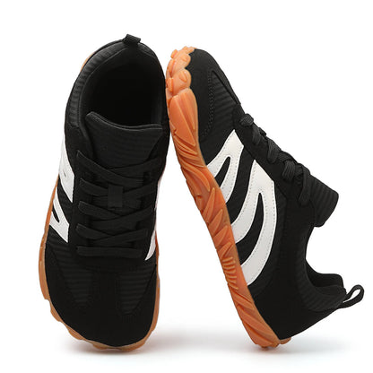 Pair of Rovik beige unisex sneakers displayed side by side