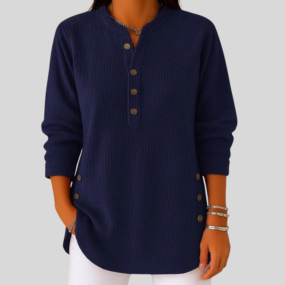 SERAPHINA™ women's pullover in white showing button side detail and relaxed fit