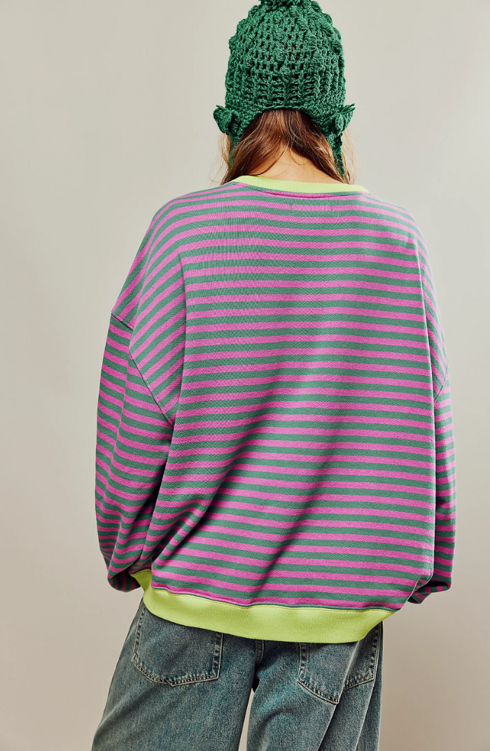 Model wearing Velma oversized knit sweater showing freedom of movement