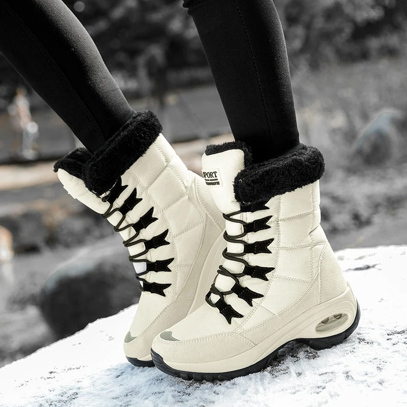 Vivara dusty mauve boots styled with a long winter coat