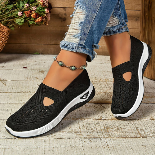 Side view of Vivienne black women's sneakers with anti-sweat system