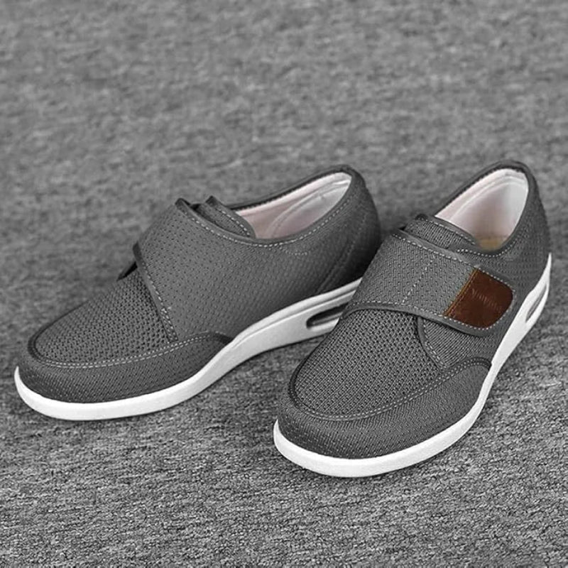 Wide-fit orthopedic shoes showing breathable stretch fabric upper