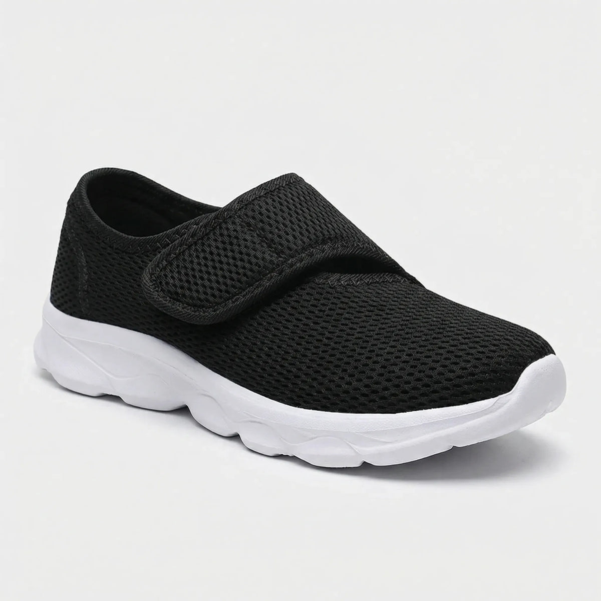 Black white orthopedic shoe with cushioned sole for all-day comfort