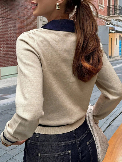 Close-up of ribbed knit texture on khaki color block polo top