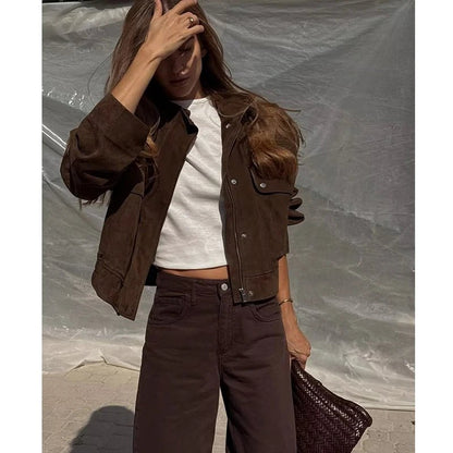 Women's tailored faux suede jacket with structured collar, close-up detail