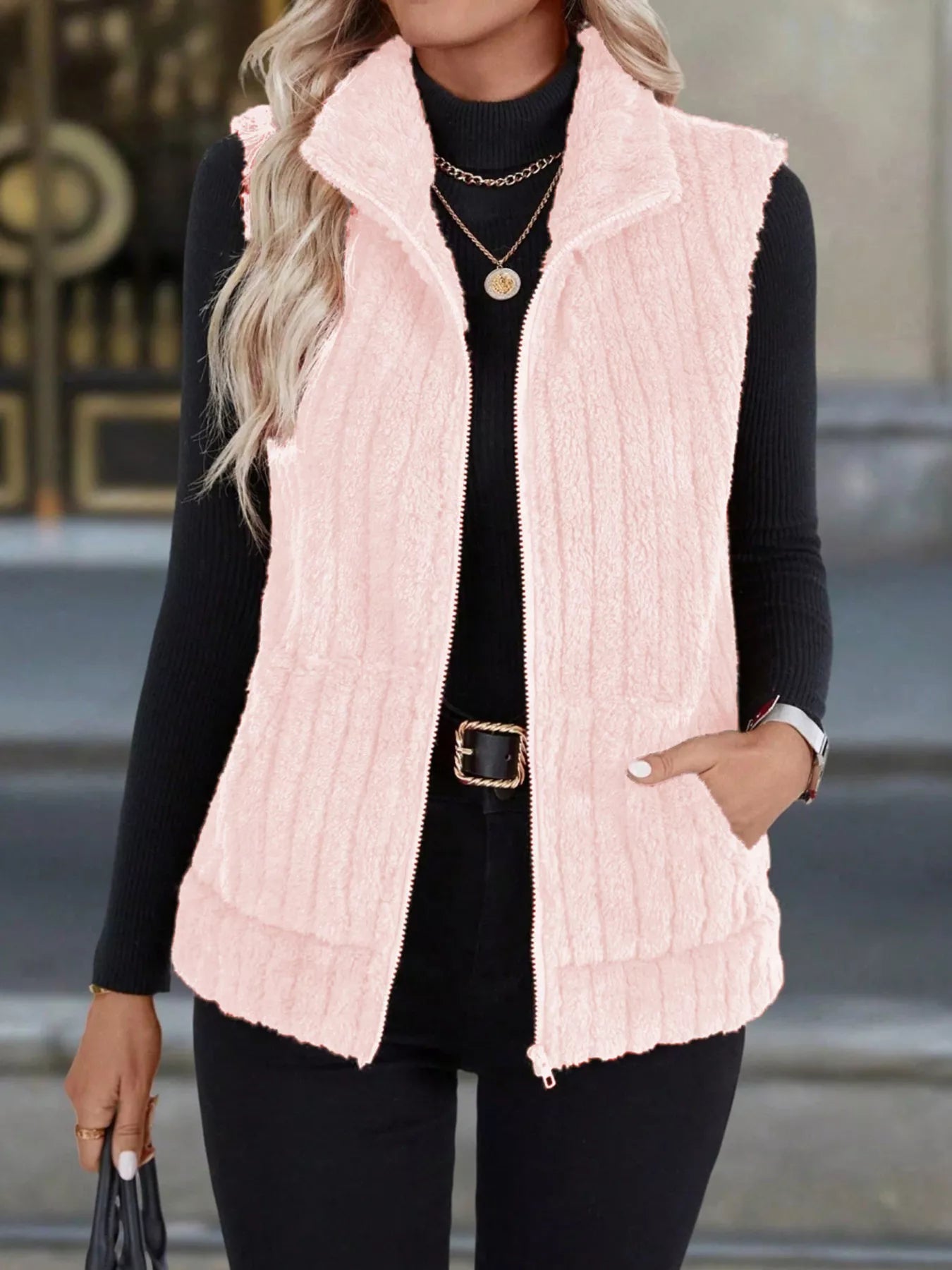 Women's fleece zip-up vest shown in full length