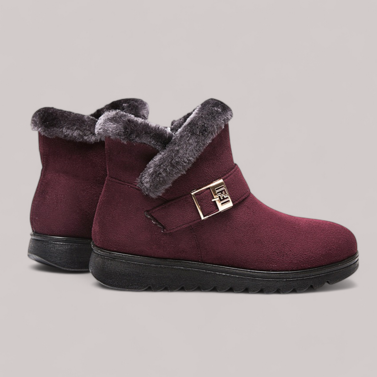 Side view of women's fur-lined suede winter ankle boots