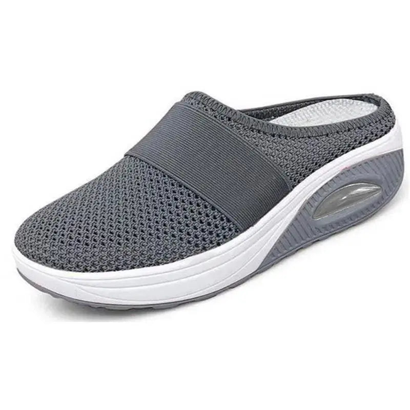 Oralie orthopedic slippers in blue, worn lifestyle shot