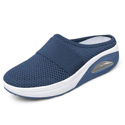 Women's supportive platform slippers in teal, close-up of sole