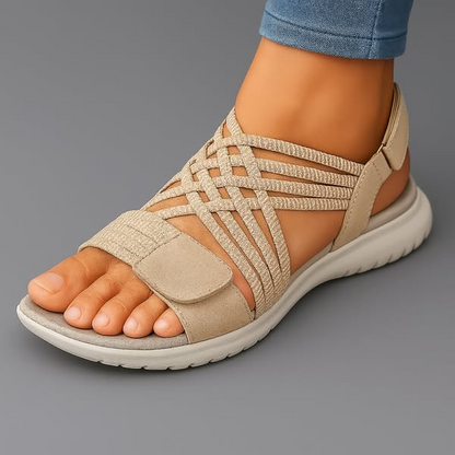 Avena women's orthopedic sandals in blue worn outdoors on a park path