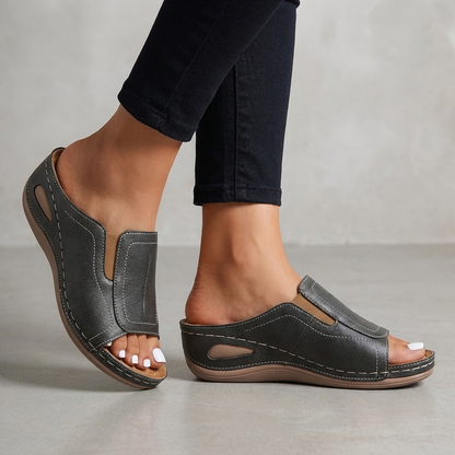 Close-up of cushioned comfort sole on women's slip-on sandals