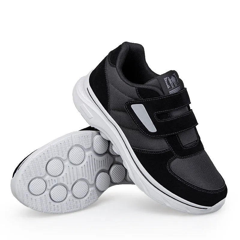Women's orthopedic sneakers in black and grey color variants side by side