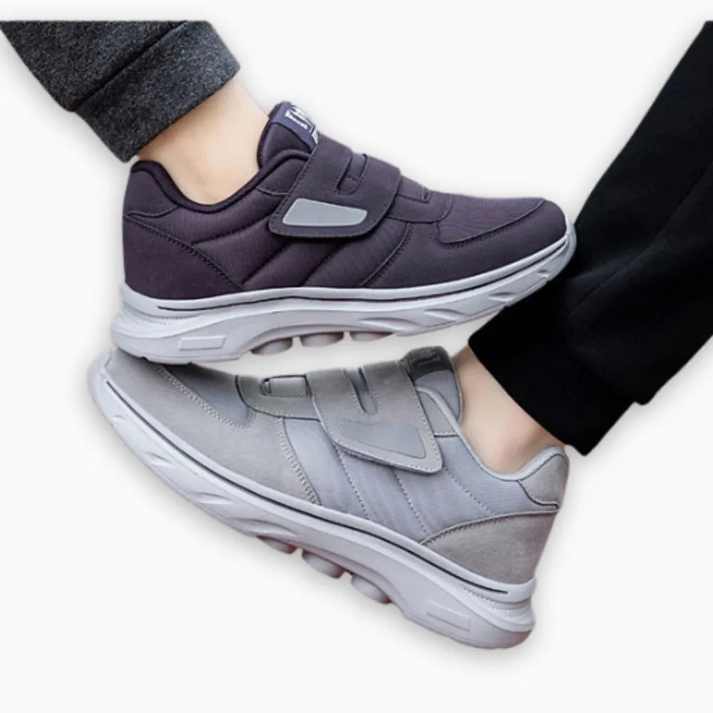 Women's orthopedic sneakers in anthracite grey on white background