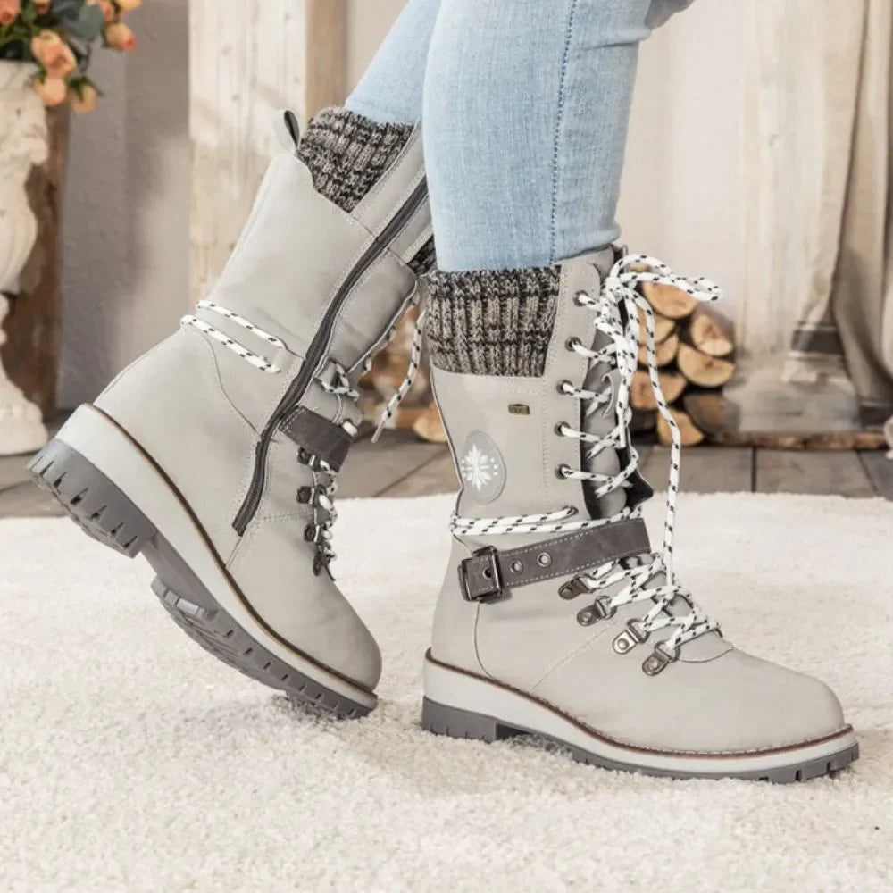 Frostiva winter boots green color worn outdoors in winter conditions